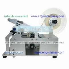 الة لصق الليبل على الزجاجة المياه